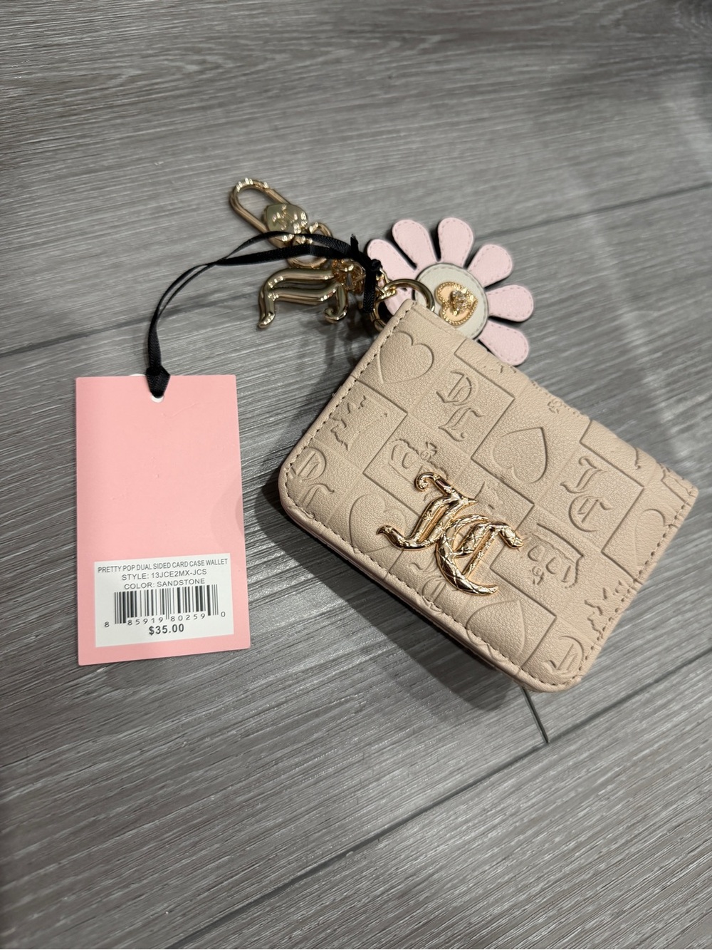 Juicy Couture Sandstone Embossed Card Case with Pink Daisy Charm